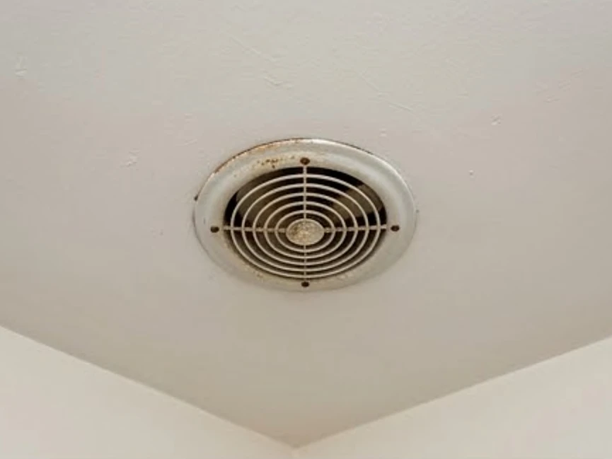 Bathroom exhaust fan in a ceiling, older home
