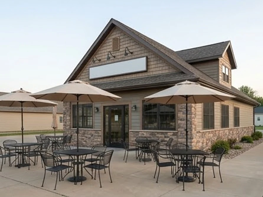 Small-town restaurant building with an empty patio, morning
