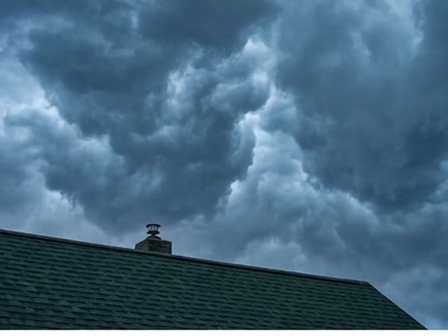 Storm clouds over a Minnesota home, close-up