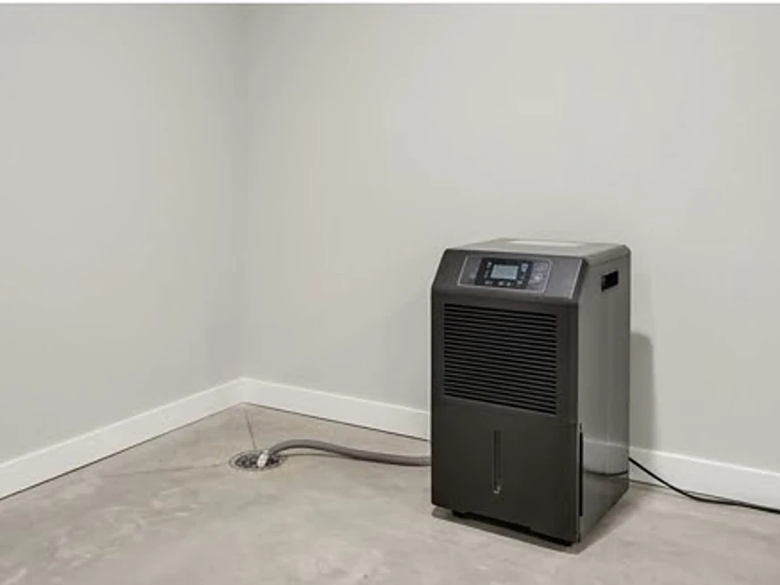 Basement with a dehumidifier running, newer basement