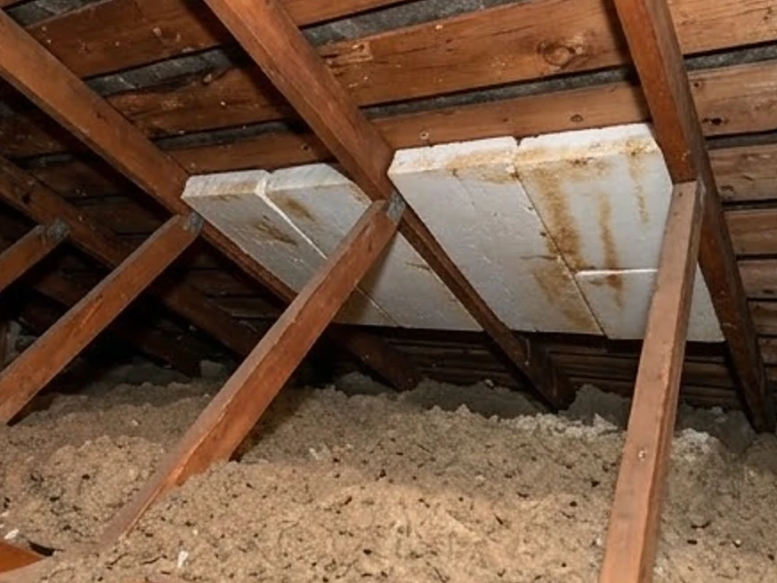 Attic interior with vent baffles, older home: roof inspection in Eagan, MN