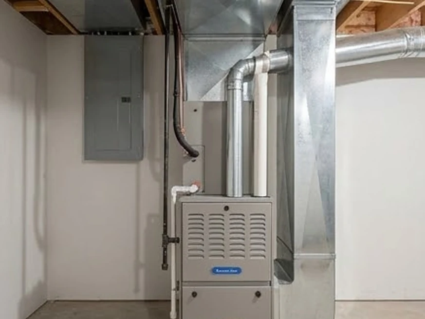 Furnace and ductwork in a basement, newer Minnesota home: full home inspection in Minnesota and Iowa