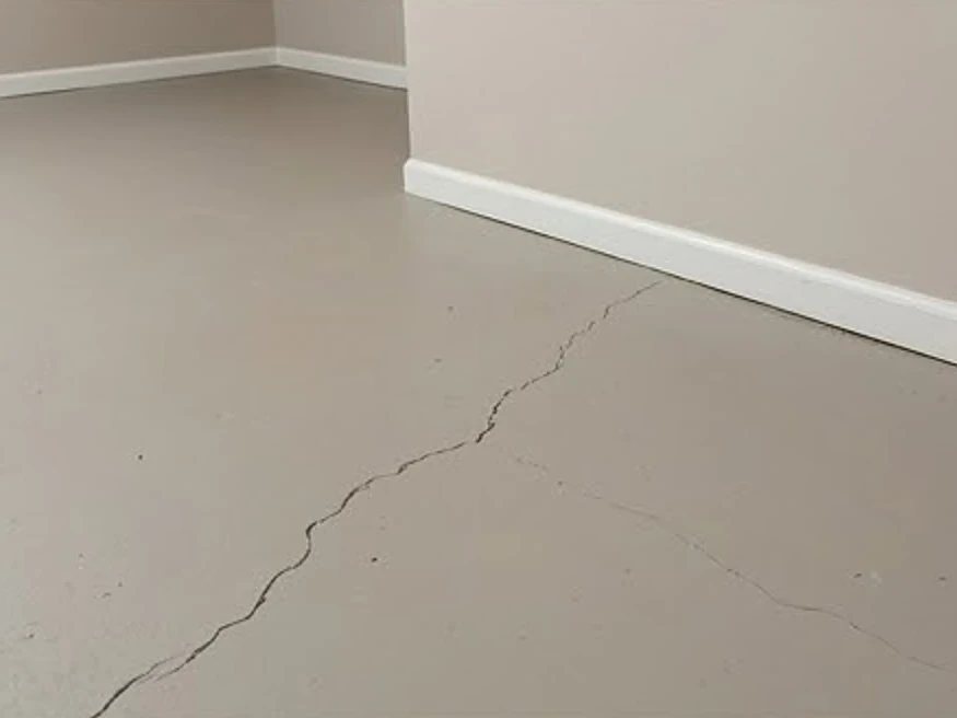 Crack in a basement floor slab, finished basement or home: radon testing in Kenyon, MN