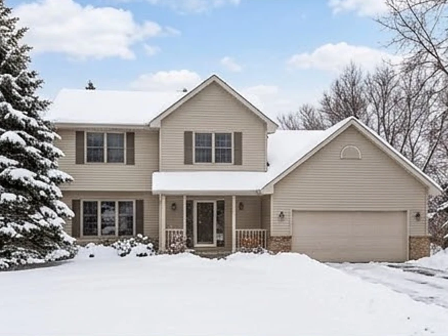 1990s two-story front, winter snow: residential inspection in Maplewood, MN