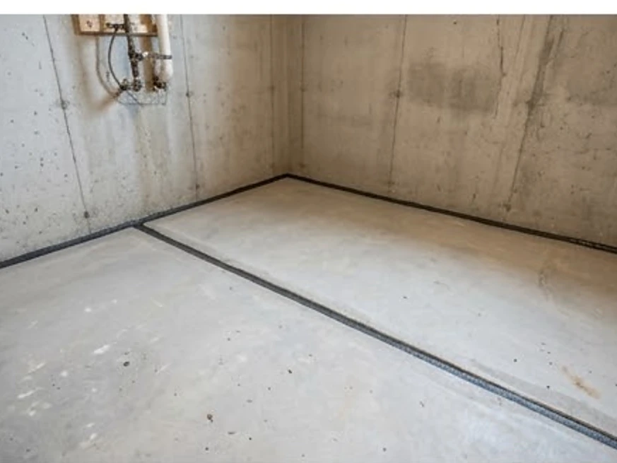 Basement slab with sealed joint, wider view: radon testing in Hopkins, MN