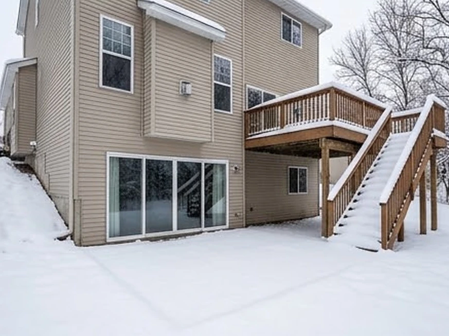 Walkout lower level, winter: radon testing in Blaine, MN