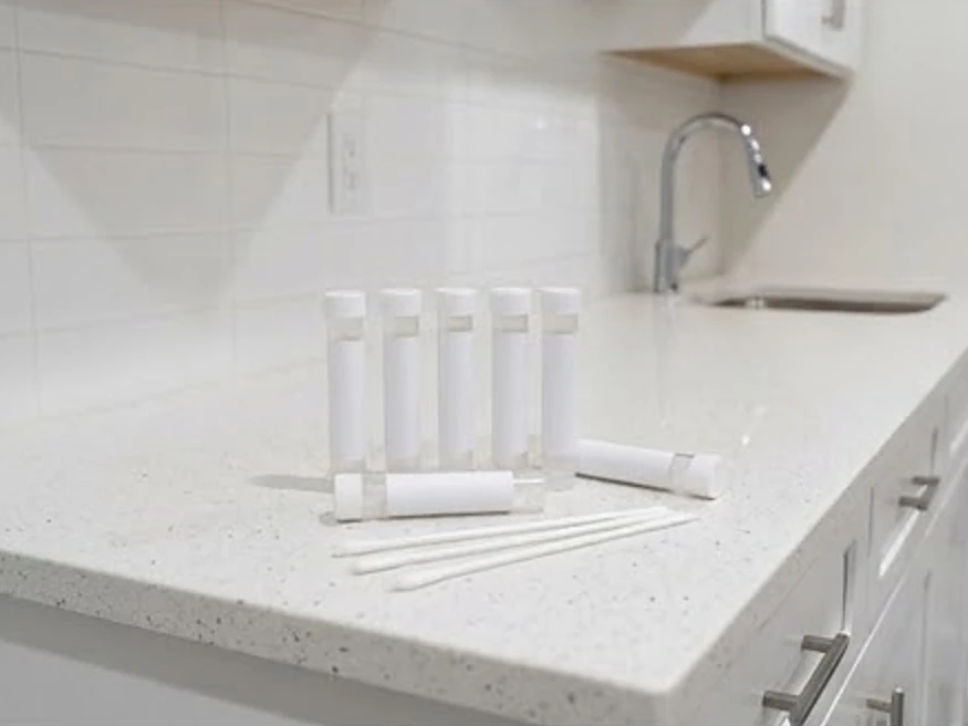 Surface swab kit on a counter (blank labels), newer basement: mold inspection in Osseo, MN