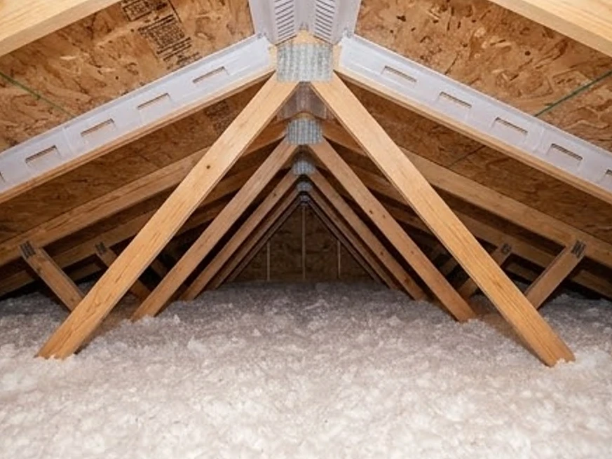 Attic with good ventilation baffles, newer home: roof inspection in Elk River, MN