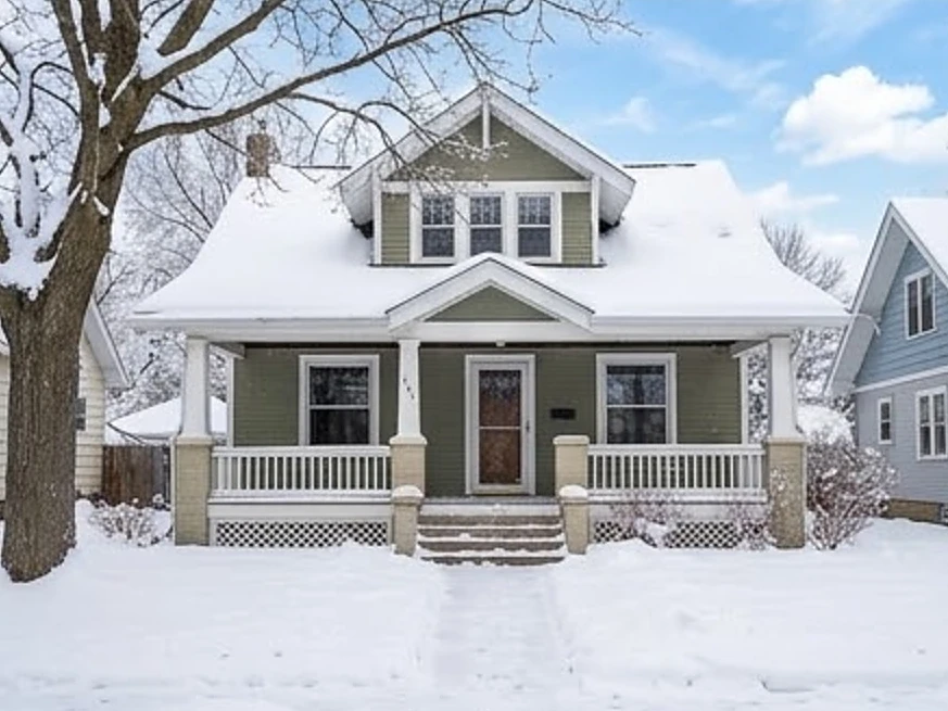 1920s bungalow front, winter snow: sewer scope inspection in Edina, MN