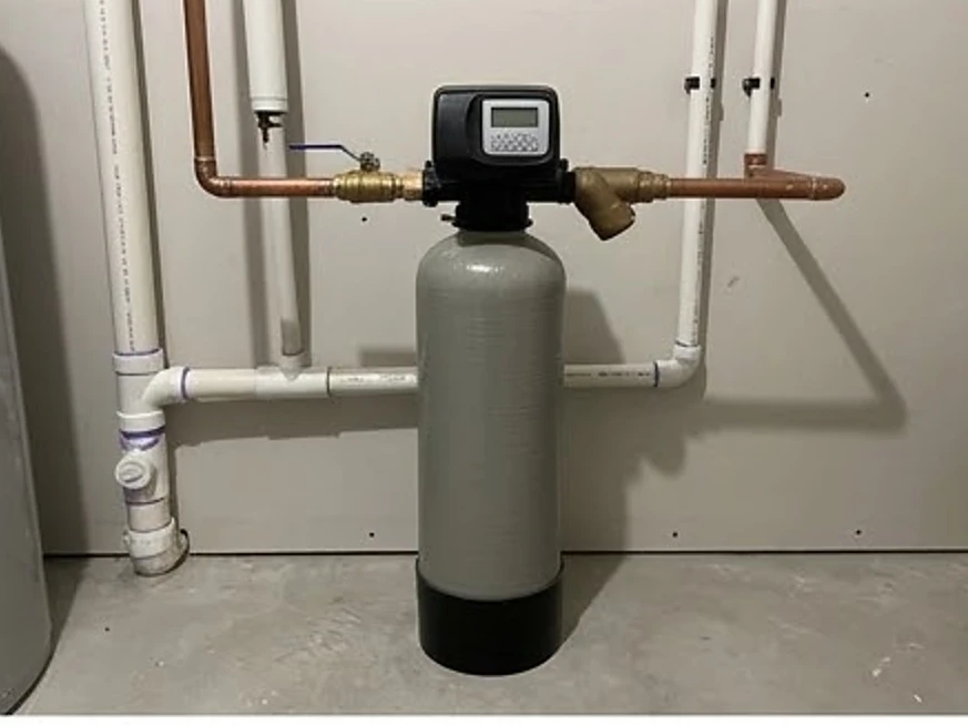 Iron filter tank on the water line in a newer Iowa basement (Humboldt County, Iowa)