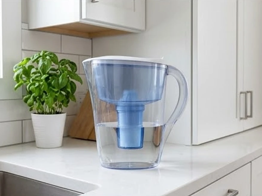 Water filter pitcher on a counter in a modern white Minnesota kitchen (Pipestone County, Minnesota)